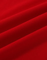 A vibrant red cotton stretch fabric with soft folds, suitable for polo shirts. Features a logo.