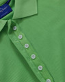 A green polo shirt featuring a classic collar and button placket, with a logo on the label.