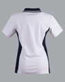 A ladies' polo shirt in white with navy contrast accents, featuring a collar and short sleeves. It has a logo detail.