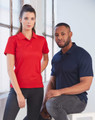 A red ladies' polo shirt and a navy men's polo shirt displayed on models, featuring a logo.