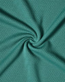 A textured fabric in a rich teal colour, showcasing a subtle grid pattern. There is a logo present.