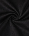 A close-up of black fabric, featuring a smooth texture with a slight stretch, typical of a polo shirt.