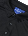 A black sustainable jacquard knit short-sleeve polo with a collar and buttons, featuring a branded tag.