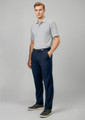 Men's navy trousers, styled with a grey polo shirt and a black belt, featuring a logo on the garment.