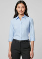 A women's light blue micro check 3/4 sleeve button-up shirt, featuring a collar and a logo on the chest.