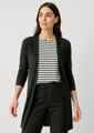 A longline cardigan in black, featuring a sleek design and open front. The model wears it over a striped top and black pants.