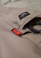 Rugged cooling stretch cargo pants in beige with a logo patch and tool loops.