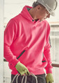 A bright pink unisex water-resistant hoodie with a front pocket and a logo, worn by a person with a hard hat and gloves.