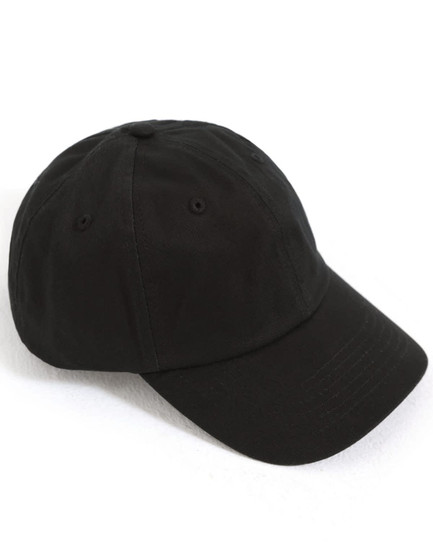 A black unstructured cotton twill cap with a curved peak and ventilation eyelets. It has a logo on the side.
