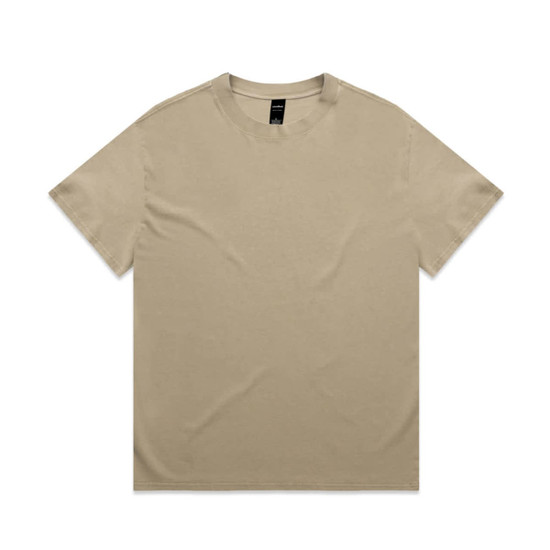A beige Heavy Faded Tee made of cotton, featuring a simple design and a tag inside.