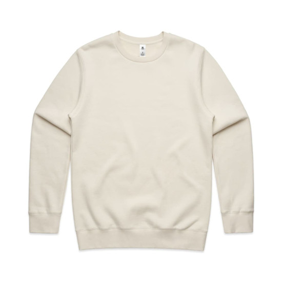 A cream-coloured jumper with a classic crew neck and long sleeves. It features a subtle logo on the label.