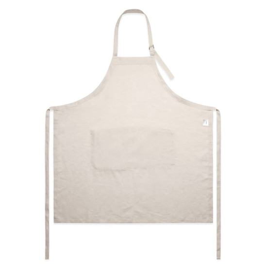 A beige linen apron featuring a front pocket and ties for securing. Includes a logo on the side.
