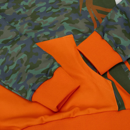 A custom youth active hoodie featuring a camouflage pattern in green and brown with orange cuffs and hem.