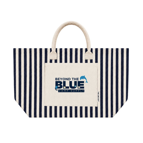 A striped tote bag with a cream base and navy blue stripes. It features a front pocket and a logo.