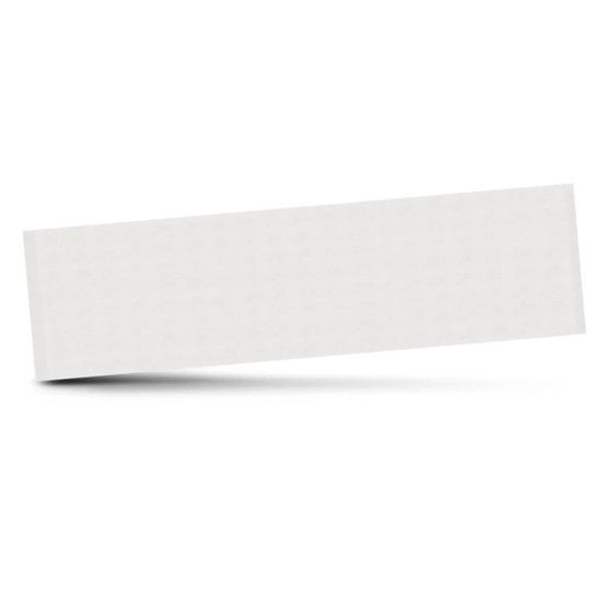 A light grey towel with a textured surface, featuring a logo on one side.