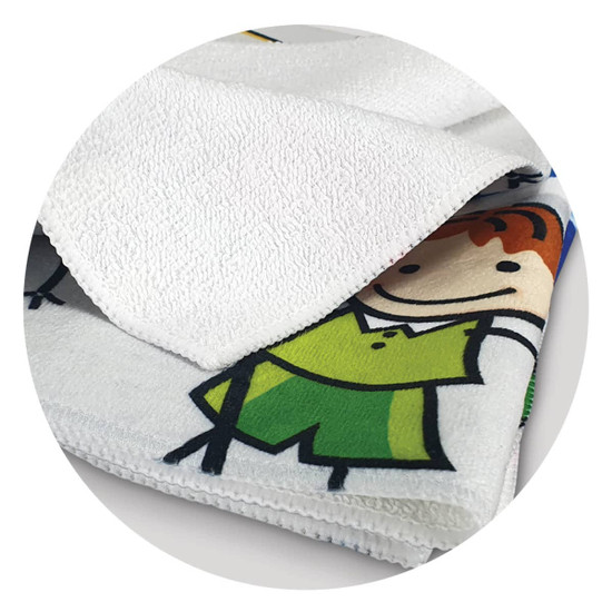 A vibrant, full-colour tea towel featuring playful cartoon designs, predominantly in white, green, and yellow shades.