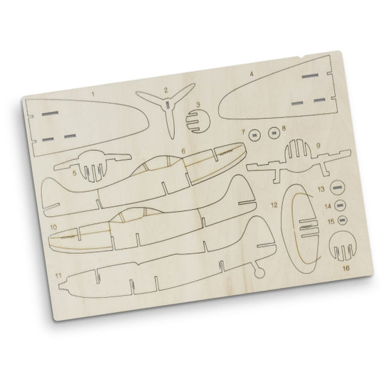 A wooden model kit of the Spitfire aircraft featuring various pre-cut parts in light beige. Includes a logo.