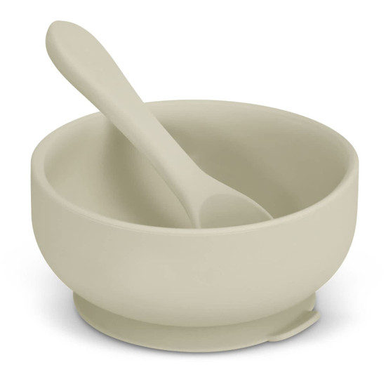 A suction bowl set featuring a soft green bowl and matching spoon, designed for kids. Includes a branding logo.