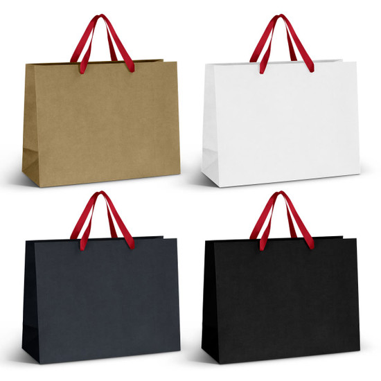 Extra large paper bags in gold, white, and black with red ribbon handles and a logo.