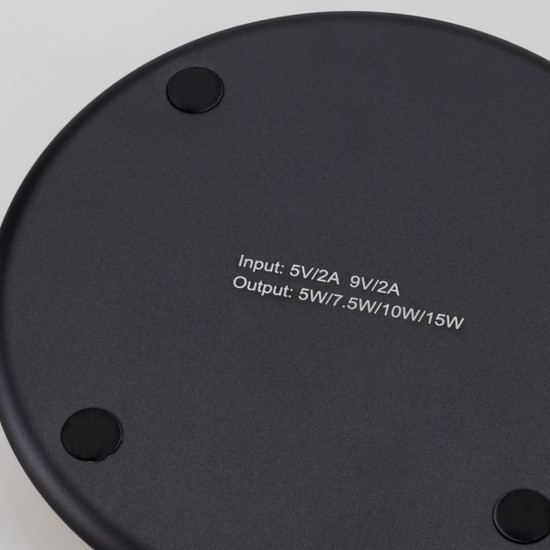 A Bamboo 15W wireless fast charger in a sleek black design, featuring a smooth surface and rubberised base for stability.