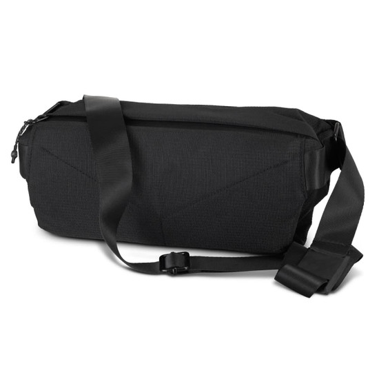 A black sling bag with a durable design and adjustable strap. It has a zip closure and features a logo.