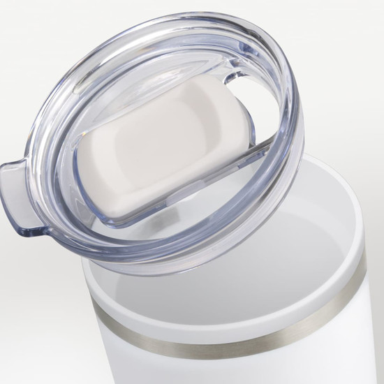 A double wall travel mug in white with a clear lid and a silver band around the top. It features a logo.