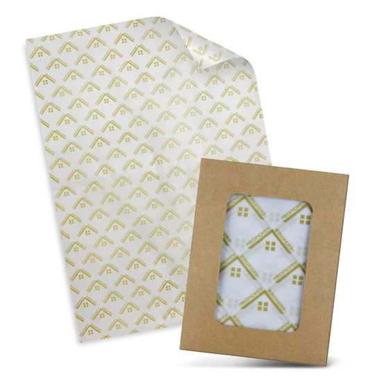 Tissue paper with a repeating house pattern, paired with a brown envelope, both in white and green hues.