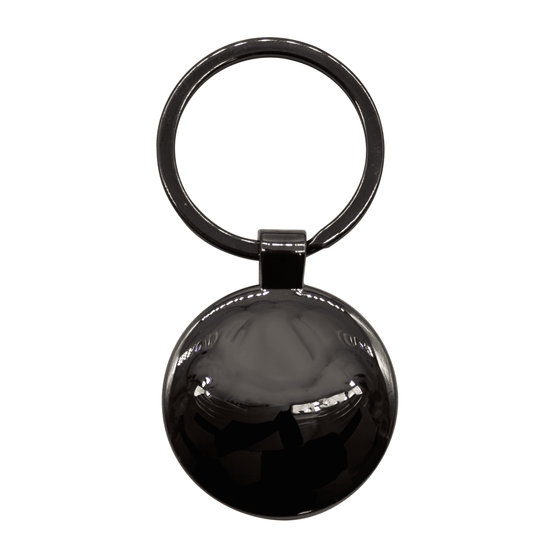 A gunmetal keychain featuring a polished circular pendant and a sturdy ring for attachment.