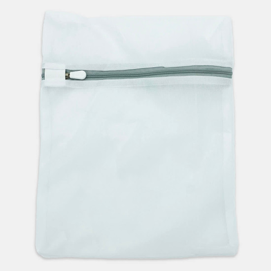 A white mesh laundry bag with a zip closure and a simple design, featuring a logo on the front.