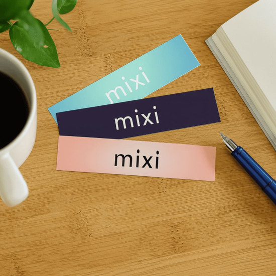 Three glossy paper stickers in teal, navy, and pink, each featuring a logo or branding space.