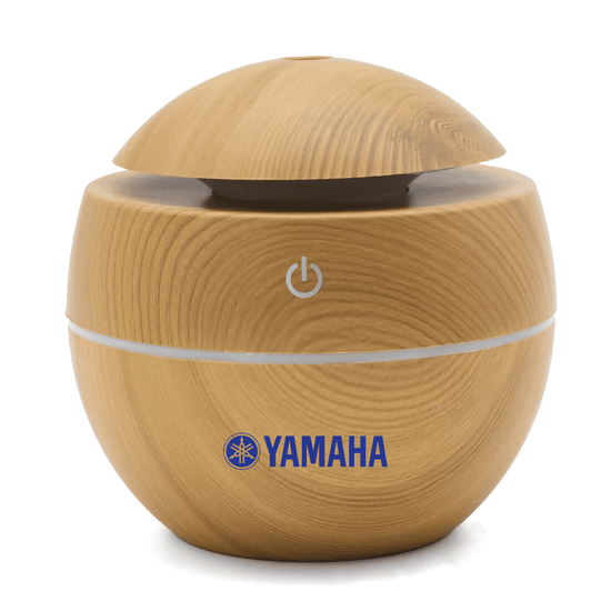 A wooden-style diffuser in a rounded design, featuring a logo and a power button on top.