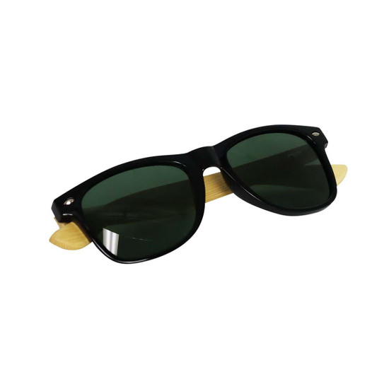 Sunglasses with black frames and green lenses, featuring bamboo accents. Includes a logo on the frame.
