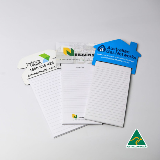 A set of magnetic to-do lists shaped like a telephone, featuring various designs and colours.
