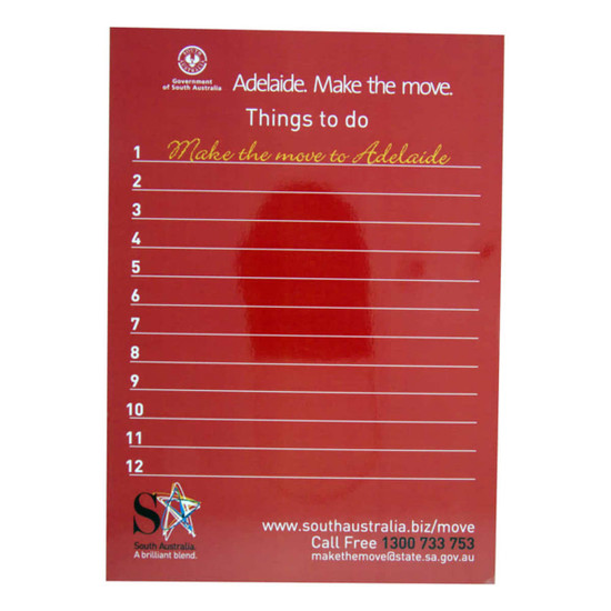 A red magnetic whiteboard featuring a list format with ten lines for notes and a logo at the bottom.