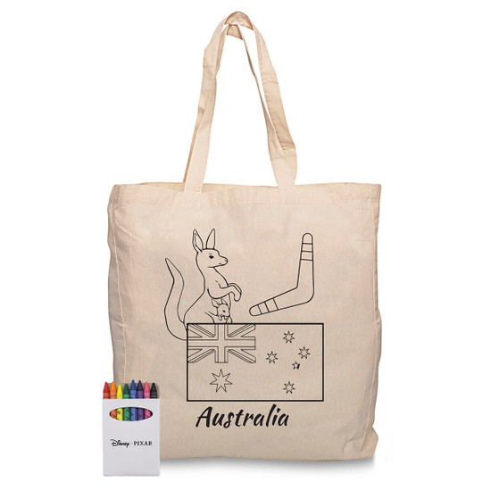 A cream Calico bag featuring an Australian design with a kangaroo and flag, accompanied by a set of colourful crayons.