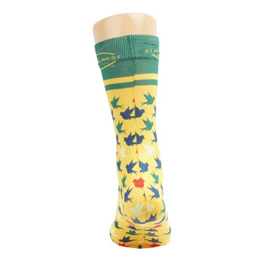 Bright yellow socks featuring a leaf pattern in green, red, and blue, with a green cuff and branding on top.