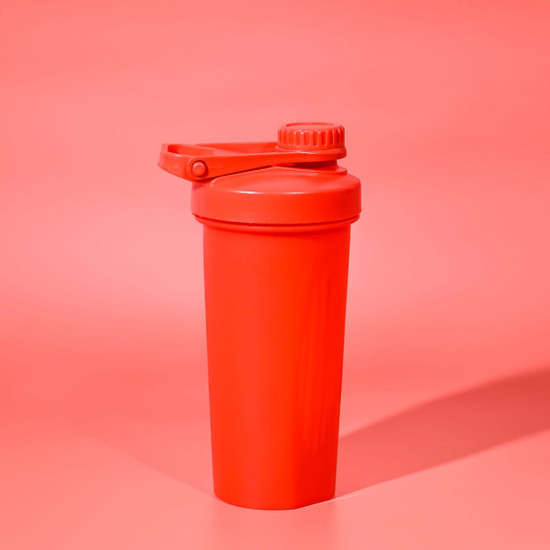 A drink bottle in vibrant red, featuring a screw-on lid and a flip-top cap, with a logo.