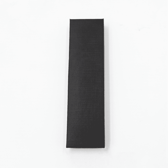 A sleek black gift box designed to hold a pen. The box has a textured surface and features a logo.