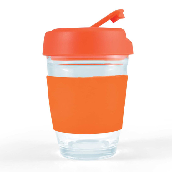 A reusable coffee cup with a transparent body and an orange silicone sleeve and lid.