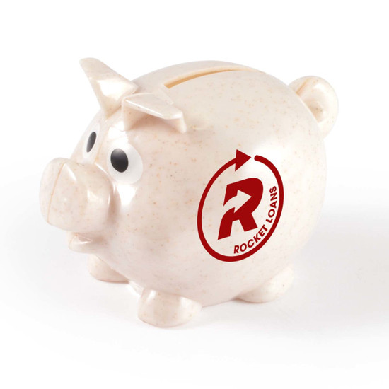 A small speckled pink piggy bank with a logo, featuring large eyes and a coin slot on top.