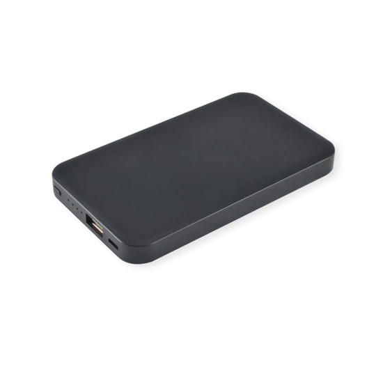 A black wireless power bank with a slim design and an integrated USB port. It features a discrete logo.
