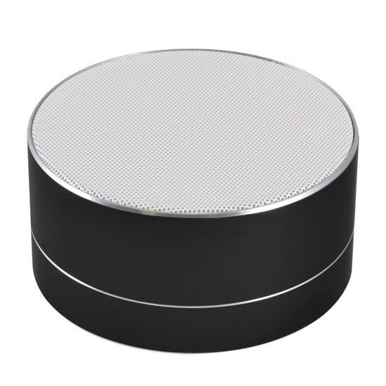 A round black Bluetooth speaker with a perforated silver top, designed for portability and stylish audio delivery.