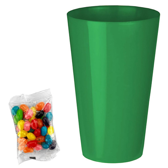A bright green party cup next to a bag of colourful jelly beans in various shades. The bag is transparent.