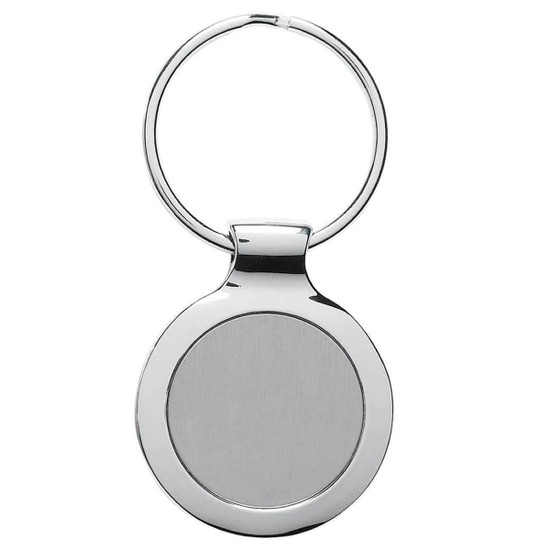 A silver discus key ring with a circular design and a smooth, plain surface, featuring a branding logo.