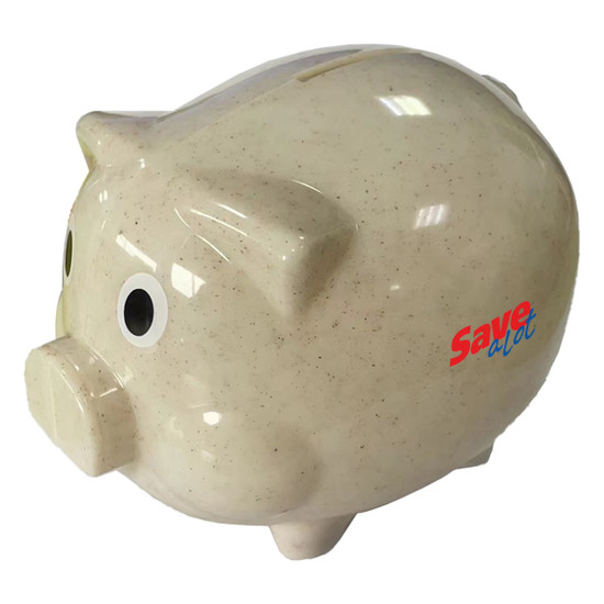 A cream-coloured piggy bank made from wheat straw, featuring large eyes and a logo.