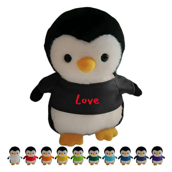 A plush penguin in black and white with a yellow beak, wearing a shirt that says "Love", surrounded by smaller penguins in various colours.