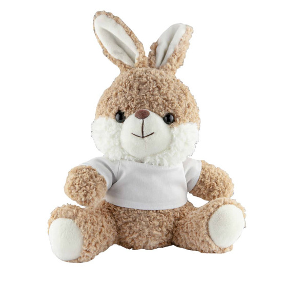 A soft, plush rabbit in light brown with a white belly, wearing a small white shirt. It has long ears and a friendly expression.
