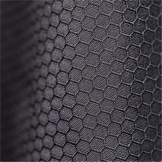 A close-up of textured black fabric with a hexagonal pattern, featuring a subtle sheen.
