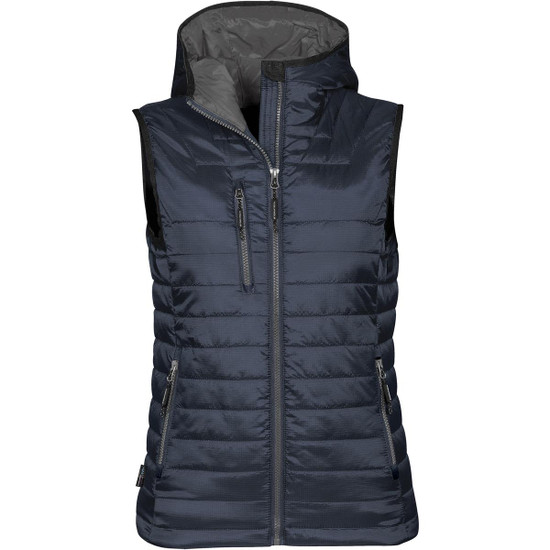 A navy women's thermal vest with a zip front, hood, and multiple zippered pockets. It features a logo on the side.