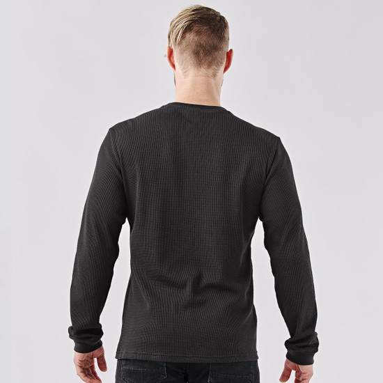 A men's crew neck shirt in ash grey, featuring long sleeves and a simple design, with a logo on the back.